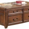 Ashley Furniture Tables Woodboro - Dark Brown - Lift Top Cocktail Table