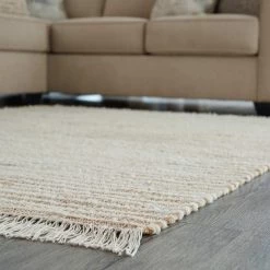 Signature Design By Ashley® Millennium - Natural/cream - Medium Rug Accessories