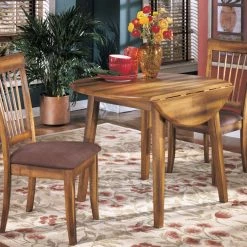 Ashley® Berringer - Dark Brown - Round Drm Drop Leaf Table