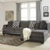Benchcraft® Sectionals Kumasi - Gray Dark - Laf Sofa & Raf Chaise Sectional