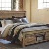 Signature Design By Ashley® Sommerford - Brown - King Storage Bed