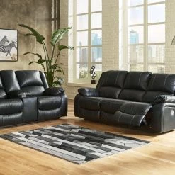 Signature Design By Ashley® Calderwell - Reclining Power Sofa, Double Reclining Power Loveseat With Console
