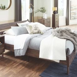 Signature Design By Ashley® Calverson - Mocha - Queen Panel Platform Bed