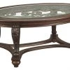 Ashley Furniture Norcastle - Dark Brown - Oval Cocktail Table