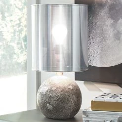 Ashley Furniture Kadian - Gray - Poly Table Lamp (1/cn)