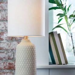 Ashley Furniture Donnford - Gray - Ceramic Table Lamp (1/cn) Accessories 6 Ashley Furniture Donnford - Gray - Ceramic Table Lamp (1/cn) Accessories