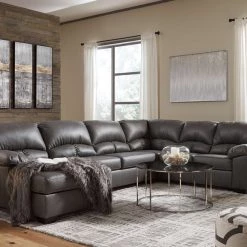 Benchcraft® Aberton - Sectional With Chaise