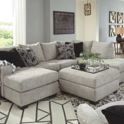 Benchcraft® Megginson - Sectional With Chaise