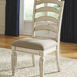 Ashley Furniture Realyn - Chipped White - Dining Uph Side Chair (2/cn) - Ladderback