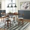 Signature Design By Ashley® Valebeck - Best In Class Rectangular Dining Room Counter Table, 4 Upholstered Swivel Barstools